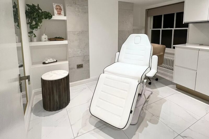Beauty therapy room at TBXH with a white treatment chair