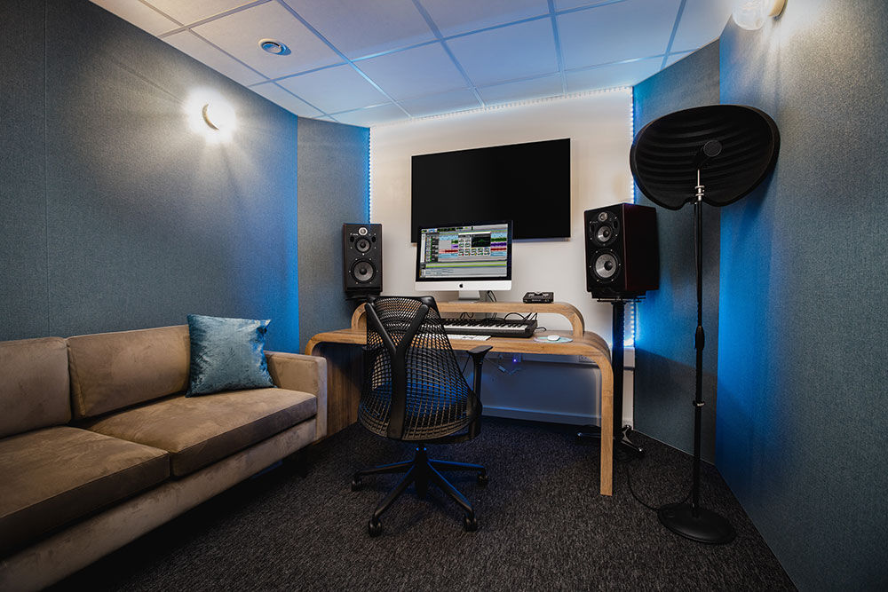 Production Suite (Studio 3) at The Halley with desk, monitors, speakers and a sofa